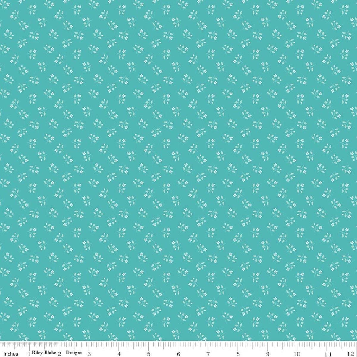 Image of Chasing Rainbows Scattered Stems Cottage quilting cotton fabric by Leslie Ryan for Riley Blake Designs. Features flowers on a blue background. Cute Little Fabric Shop.