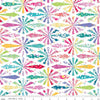 Image of Chasing Rainbows Cheater Print Multi quilting cotton fabric by Leslie Ryan for Riley Blakes Designs. Features diamonds on a white background. Cute Little Fabric Shop.