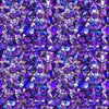 Image of Lumenique Mosaic Blender Violet quilting cotton fabric by Dan Morris for QT Fabrics. Features a printed stained glass pattern on a purple background. Cute Little Fabric Shop.