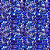 Image of Lumenique Mosaic Blender Lapis quilting cotton fabric by Dan Morris for QT Fabrics. Features a printed stained glass pattern on a blue background. Cute Little Fabric Shop.