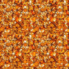 Image of Lumenique Mosaic Blender Burnt Orange quilting cotton fabric by Dan Morris for QT Fabrics. Features a printed stained glass pattern on an orange background. Cute Little Fabric Shop.
