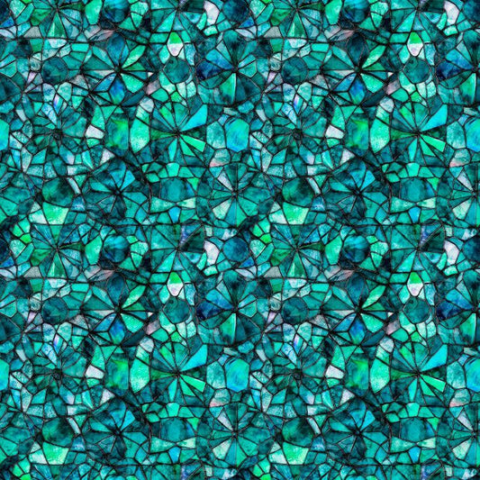 Image of Lumenique Mosaic Blender Lagoon quilting cotton fabric by Dan Morris for QT Fabrics. Features a printed stained glass pattern on a blue background. Cute Little Fabric Shop.