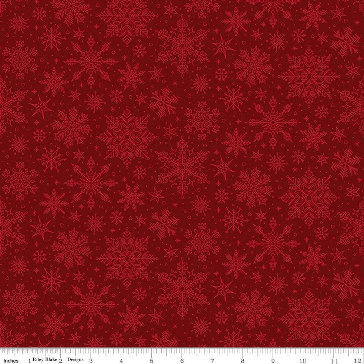 Image of Poinsettias at Christmas Snowflakes Red quilting cotton fabric by Jennifer Bosworth for Riley Blake Designs. Features snowflakes on a red background. Cute Little Fabric Shop.