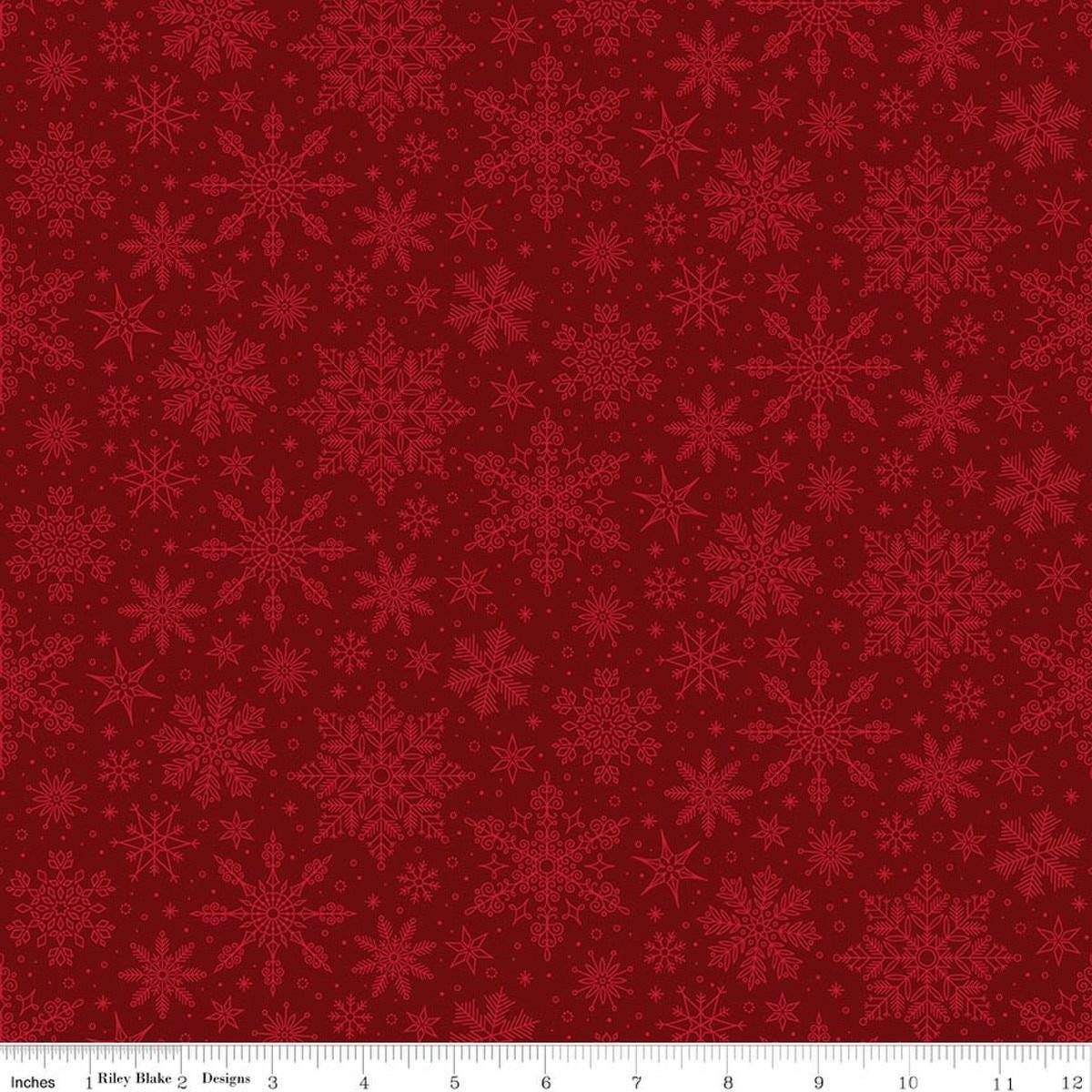 Image of Poinsettias at Christmas Snowflakes Red quilting cotton fabric by Jennifer Bosworth for Riley Blake Designs. Features snowflakes on a red background. Cute Little Fabric Shop.