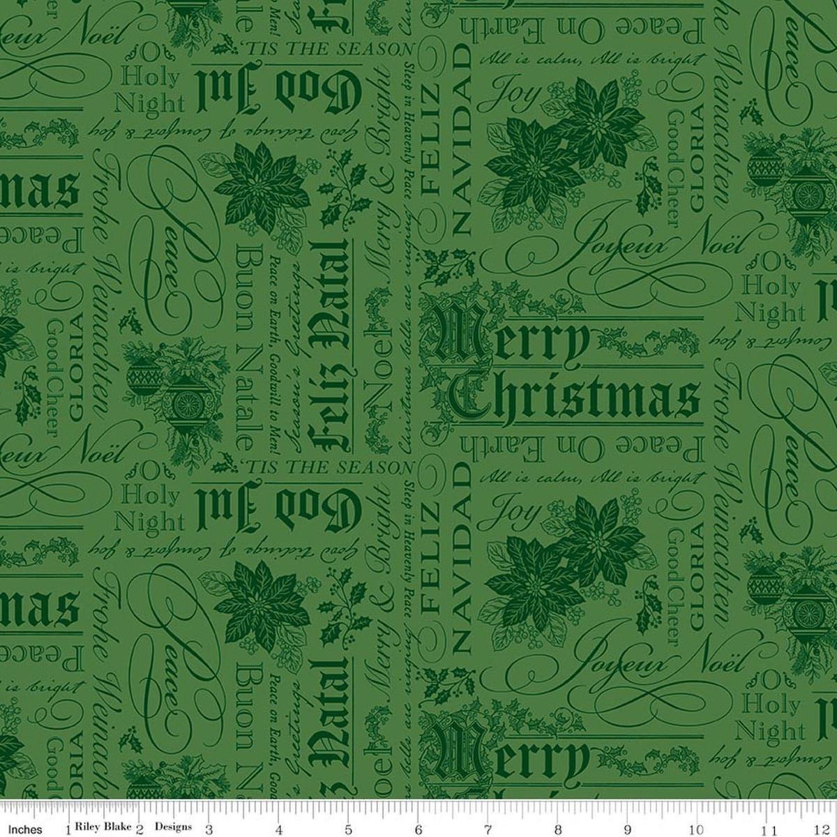 Image of Poinsettias at Christmas Text Green quilting cotton fabric by Jennifer Bosworth for Riley Blake Designs. Features words on a green background. Cute Little Fabric Shop.