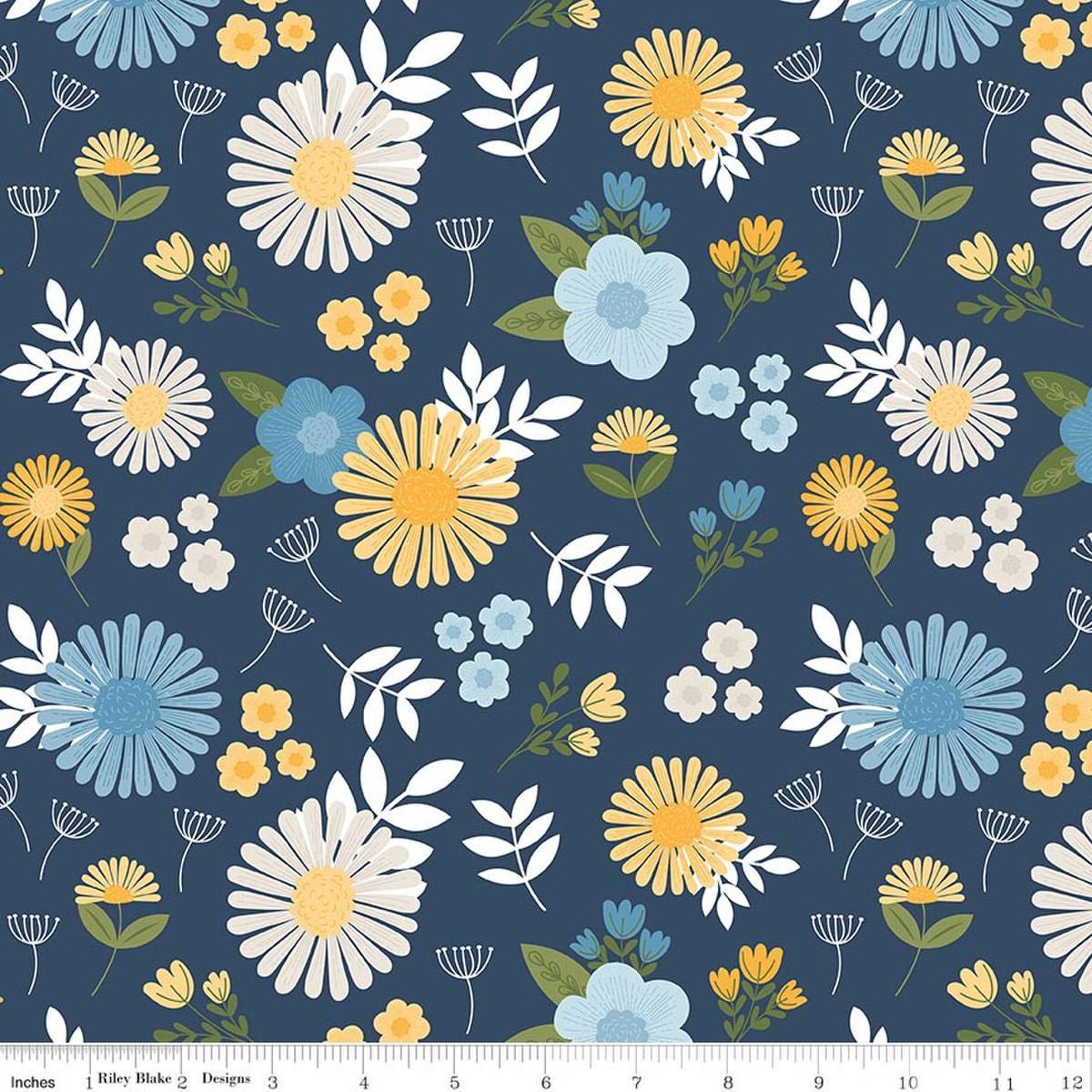 Image of Sunshine & Dandelions Main Navy quilting cotton fabric by Traci Reed for Riley Blake Designs. Features flowers on a blue background. Cute Little Fabric Shop.