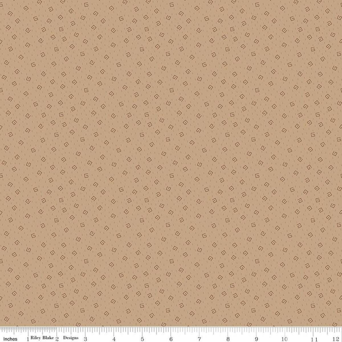 Image of Baked With Love Comfort Tea Dye quilting cotton fabric by Lori Holt for Riley Blake Designs. Features spirals on a brown background. Cute Little Fabric Shop.