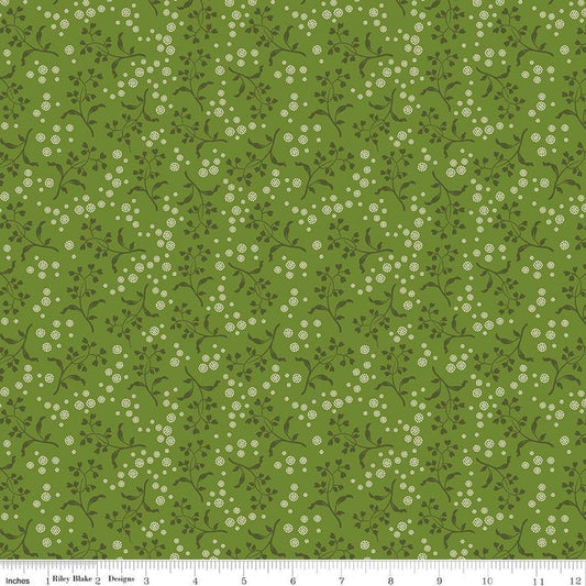 Image of Baked With Love Apron Olive quilting cotton fabric by Lori Holt for Riley Blake Designs. Features flowers on a green background. Cute Little Fabric Shop.