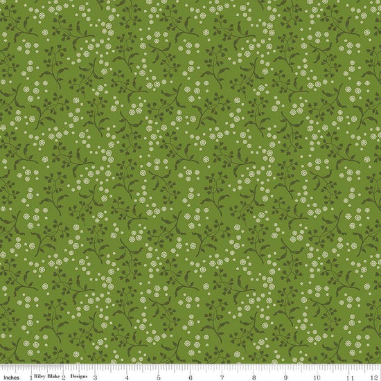 Image of Baked With Love Apron Olive quilting cotton fabric by Lori Holt for Riley Blake Designs. Features flowers on a green background. Cute Little Fabric Shop.