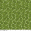 Image of Baked With Love Apron Olive quilting cotton fabric by Lori Holt for Riley Blake Designs. Features flowers on a green background. Cute Little Fabric Shop.