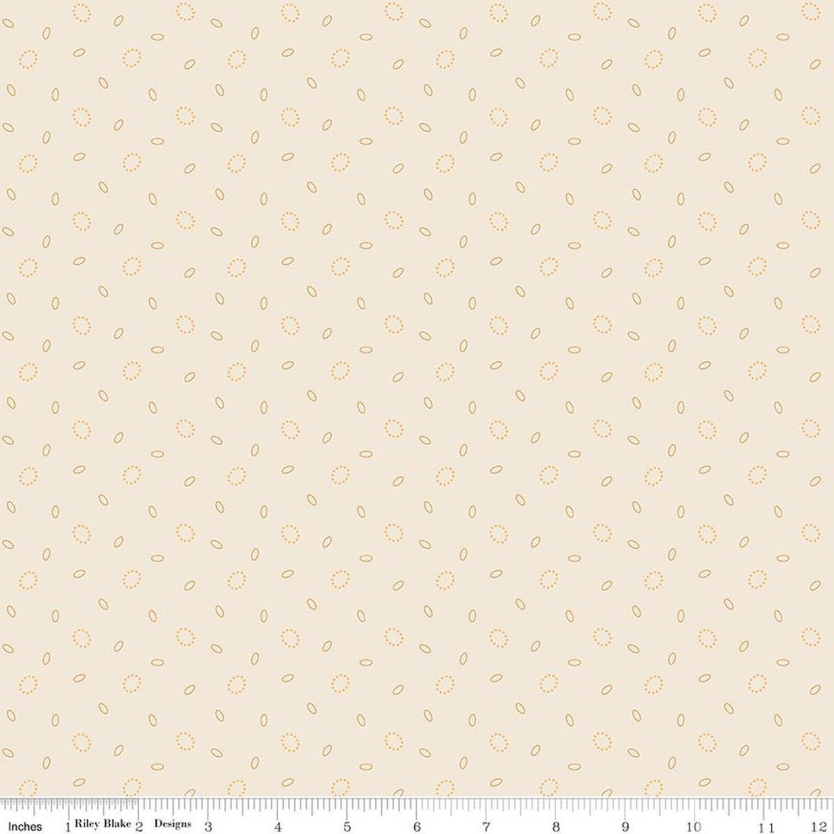 Image of Baked With Love Grandma's Pearl Marigold quilting cotton fabric by Lori Holt for Riley Blake Designs. Features circles on a cream background. Cute Little Fabric Shop.