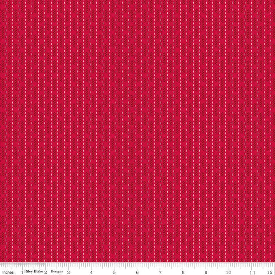 Image of Baked With Love Dish Towel Schoolhouse quilting cotton fabric by Lori Holt for Riley Blake Designs. Features stripes on a red background. Cute Little Fabric Shop.