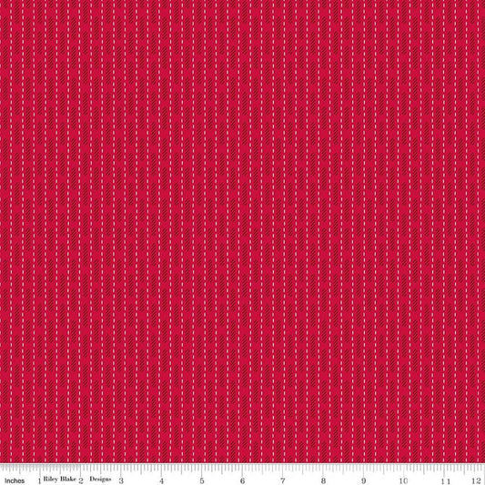 Image of Baked With Love Dish Towel Schoolhouse quilting cotton fabric by Lori Holt for Riley Blake Designs. Features stripes on a red background. Cute Little Fabric Shop.