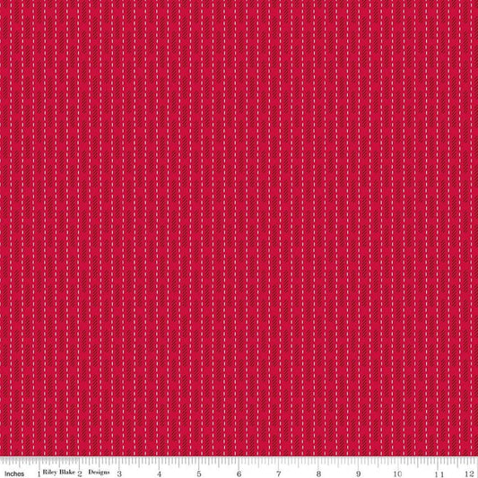 Image of Baked With Love Dish Towel Schoolhouse quilting cotton fabric by Lori Holt for Riley Blake Designs. Features stripes on a red background. Cute Little Fabric Shop.