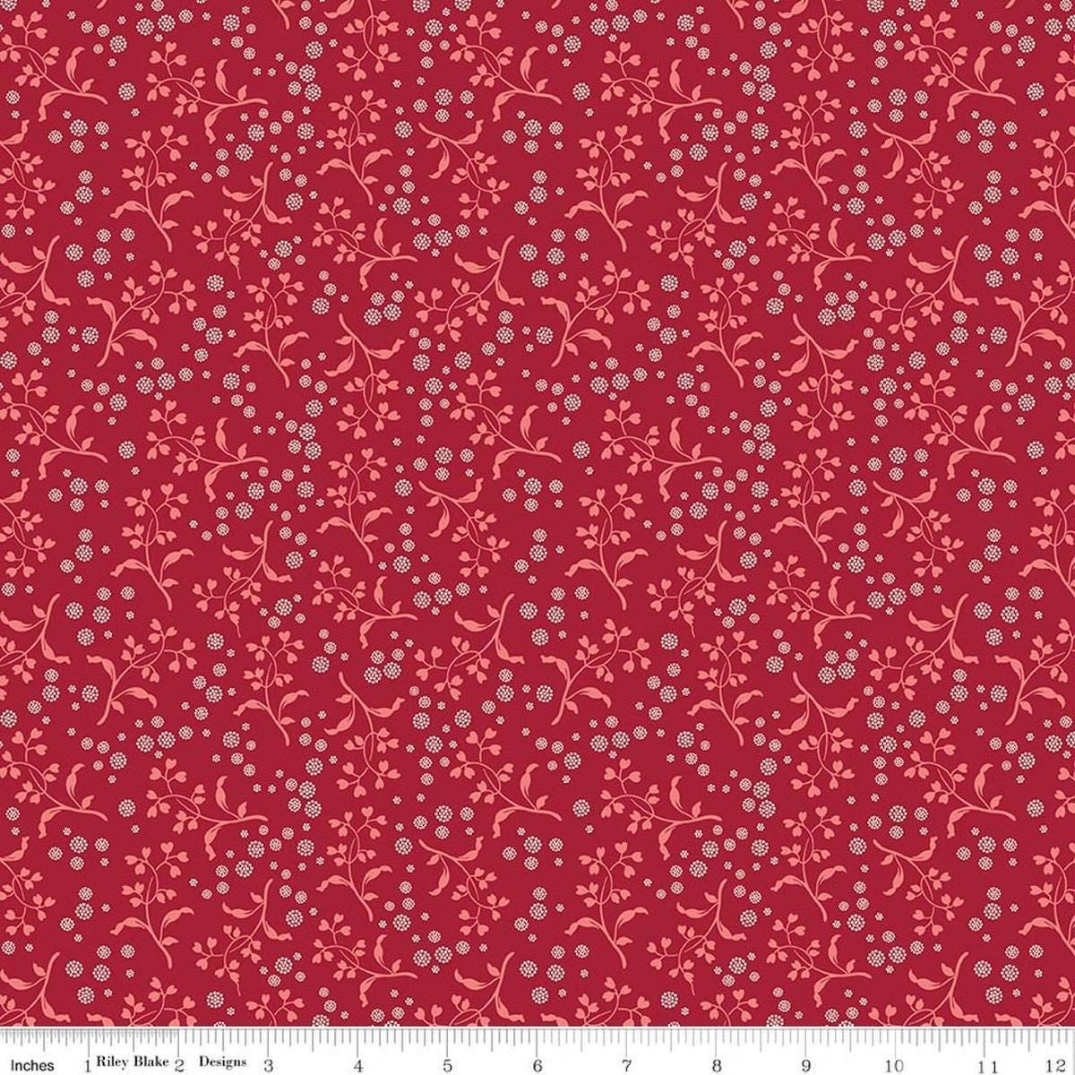 Image of Baked With Love Apron Cherry Tart quilting cotton fabric by Lori Holt for Riley Blake Designs. Features flowers on a red background. Cute Little Fabric Shop.
