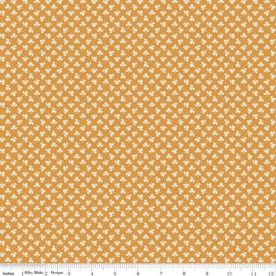 Image of Baked With Love Gathering Spice quilting cotton fabric by Lori Holt for Riley Blake Designs. Features leaves on an orange background. Cute Little Fabric Shop.