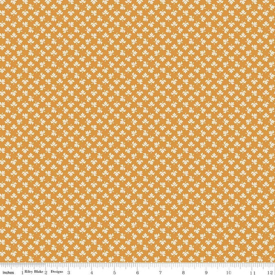 Image of Baked With Love Gathering Spice quilting cotton fabric by Lori Holt for Riley Blake Designs. Features leaves on an orange background. Cute Little Fabric Shop.