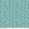 Image of Baked With Love Apron Wedgewood quilting cotton fabric by Lori Holt for Riley Blake Designs. Features flowers on a blue background. Cute Little Fabric Shop.