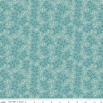 Image of Baked With Love Apron Wedgewood quilting cotton fabric by Lori Holt for Riley Blake Designs. Features flowers on a blue background. Cute Little Fabric Shop.