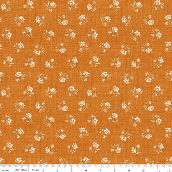 Image of Baked With Love Heirloom Amber quilting cotton fabric by Lori Holt for Riley Blake Designs. Features flowers on an orange background. Cute Little Fabric Shop.