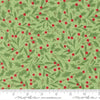 Image of Merrily on High Winter Berries Evergreen quilting cotton fabric by Sweetfire Road for Moda Fabrics. Features holly berries on a green background. Cute Little Fabric Shop.