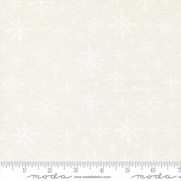 Image of Merrily on High Softly Snowing Snow White quilting cotton fabric by Sweetfire Road for Moda Fabrics. Features tonal snowflakes on a white background. Cute Little Fabric Shop.