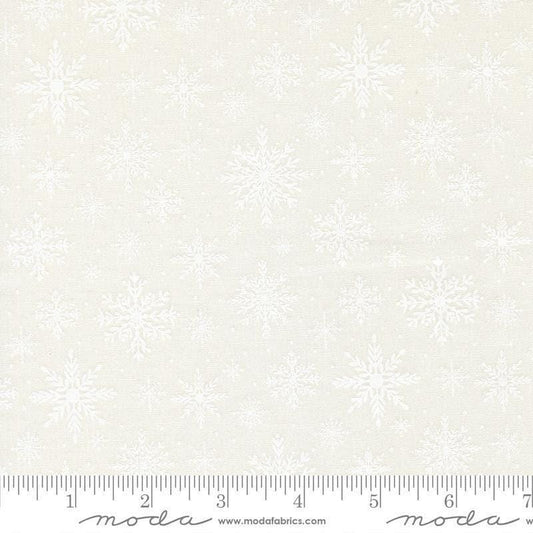 Image of Merrily on High Softly Snowing Snow White quilting cotton fabric by Sweetfire Road for Moda Fabrics. Features tonal snowflakes on a white background. Cute Little Fabric Shop.