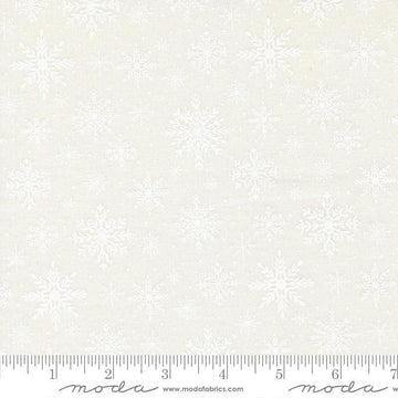 Image of Merrily on High Softly Snowing Snow White quilting cotton fabric by Sweetfire Road for Moda Fabrics. Features tonal snowflakes on a white background. Cute Little Fabric Shop.