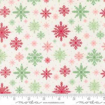 Image of Merrily on High Softly Snowing Snow quilting cotton fabric by Sweetfire Road for Moda Fabrics. Features snowflakes on a white background. Cute Little Fabric Shop.