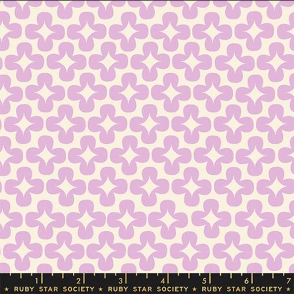 Image of Persimmon Leaf Macaron quilting cotton fabric by Rashida Coleman Hale of Ruby Star Society for Moda Fabrics. Features a geometric pattern on a purple background. Cute Little Fabric Shop.
