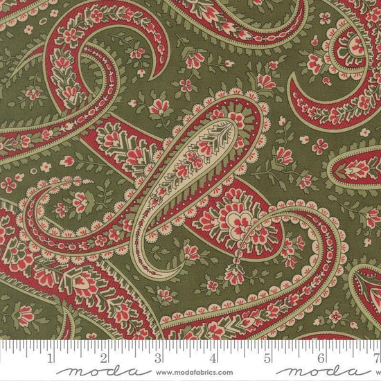 Image of Candlelight Christmas Plaza Paisley Holly quilting cotton fabric by 3 Sisters for Moda Fabrics. Features paisley on a green background. Cute Little Fabric Shop.