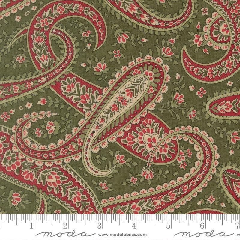 Image of Candlelight Christmas Plaza Paisley Holly quilting cotton fabric by 3 Sisters for Moda Fabrics. Features paisley on a green background. Cute Little Fabric Shop.