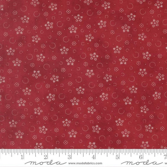 Image of Candlelight Christmas Festive Flurries Crimson quilting cotton fabric by 3 Sisters for Moda Fabrics. Features snowflakes on a red background. Cute Little Fabric Shop.