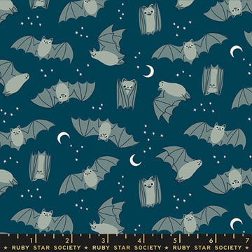 Image of Freaky Familiars Fat Bats Galaxy quilting cotton fabric by Ruby Star Society for Moda Fabrics. Features bats on a blue background. Cute Little Fabric Shop.