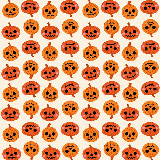 Image of Freaky Familiars Pumpkin Party Orange quilting cotton fabric by Ruby Star Society for Moda Fabrics. Features pumpkins on a cream background. Cute Little Fabric Shop.