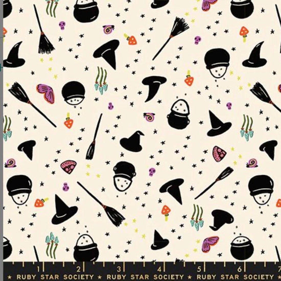 Image of Freaky Familiars Witchy Woman Natural quilting cotton fabric by Ruby Star Society for Moda Fabrics. Features witchy accessories on a cream background. Cute Little Fabric Shop.