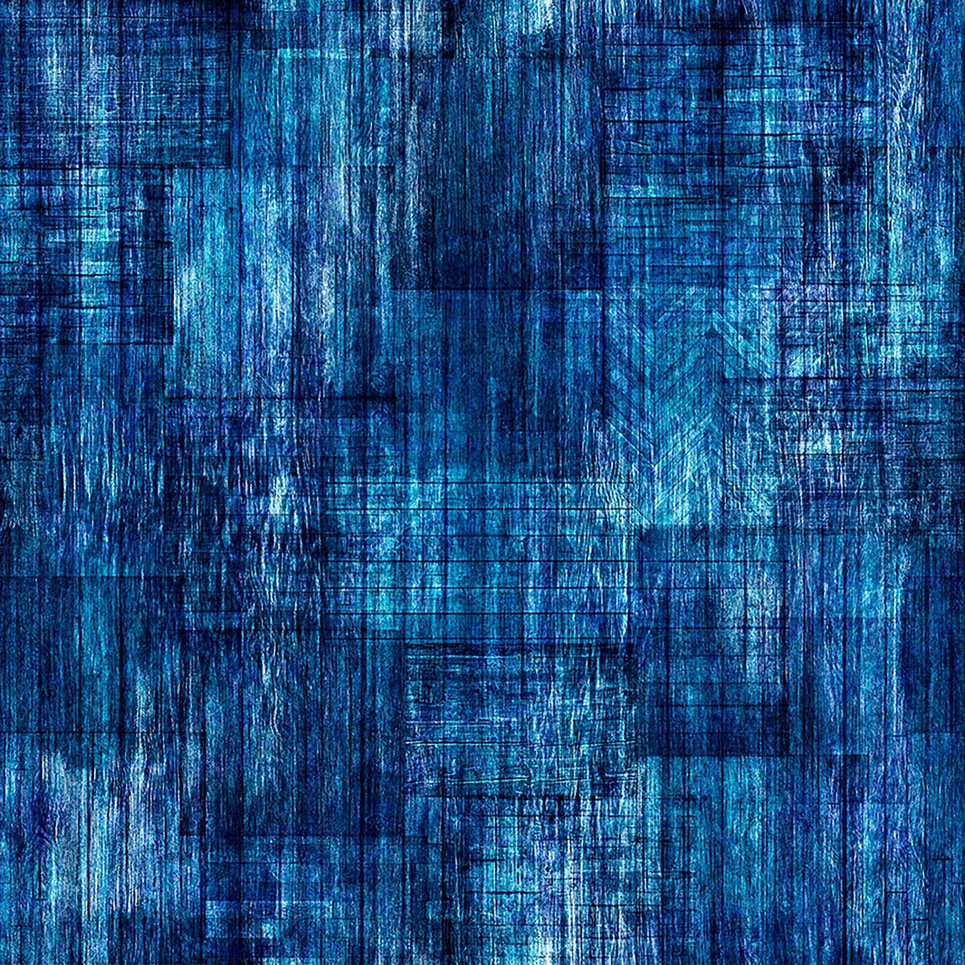 Image of Into The Woods Wood Texture Denim quilting cotton fabric by Morris Creative Group for QT Fabrics. Features printed wood texture on a blue background. Cute Little Fabric Shop.