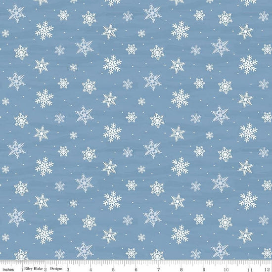 Image of Covered Bridges in Winter Snowflakes Blue quilting cotton fabric by Tara Reed for Riley Blake Designs. Features snowflakes on a blue background. Cute Little Fabric Shop.