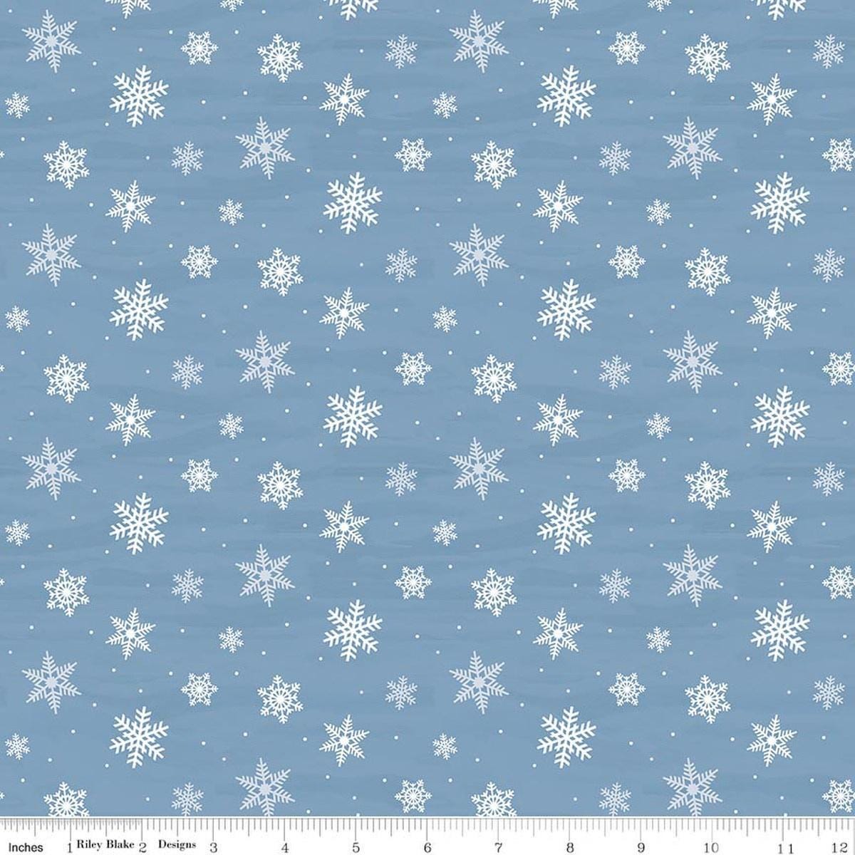 Image of Covered Bridges in Winter Snowflakes Blue quilting cotton fabric by Tara Reed for Riley Blake Designs. Features snowflakes on a blue background. Cute Little Fabric Shop.