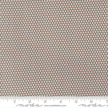 Image of Chilly Snowball Coal quilting cotton fabric by Sweetwater for Moda Fabrics. Features a geometric pattern on a black background. Cute Little Fabric Shop.