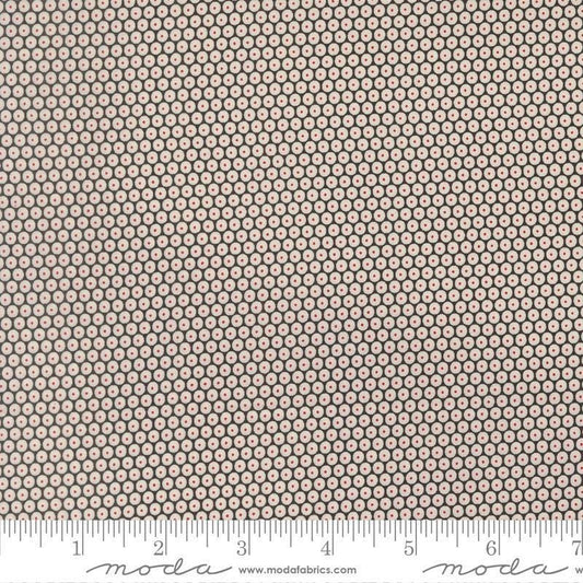 Image of Chilly Snowball Coal quilting cotton fabric by Sweetwater for Moda Fabrics. Features a geometric pattern on a black background. Cute Little Fabric Shop.