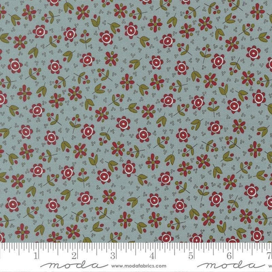 Image of Chilly Christmas Flowers Storm quilting cotton fabric by Sweetwater for Moda Fabrics. Features flowers on a blue background. Cute Little Fabric Shop.