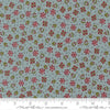 Image of Chilly Christmas Flowers Storm quilting cotton fabric by Sweetwater for Moda Fabrics. Features flowers on a blue background. Cute Little Fabric Shop.