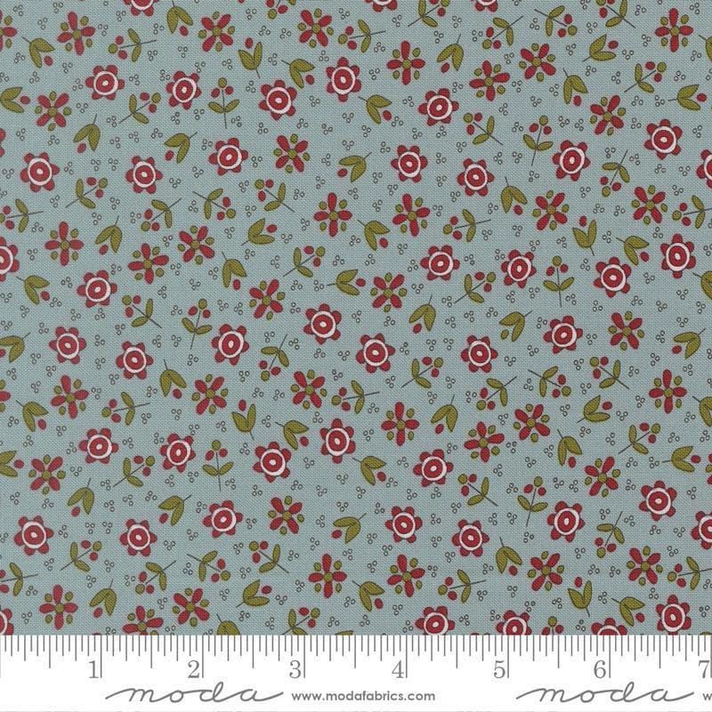 Image of Chilly Christmas Flowers Storm quilting cotton fabric by Sweetwater for Moda Fabrics. Features flowers on a blue background. Cute Little Fabric Shop.