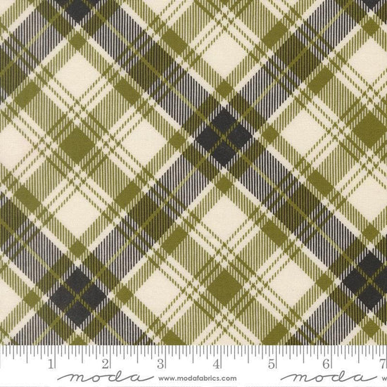 Image of Chilly Plaid Pine quilting cotton fabric by Sweetwater for Moda Fabrics. Features plaid on a green, cream, and blue background. Cute Little Fabric Shop.