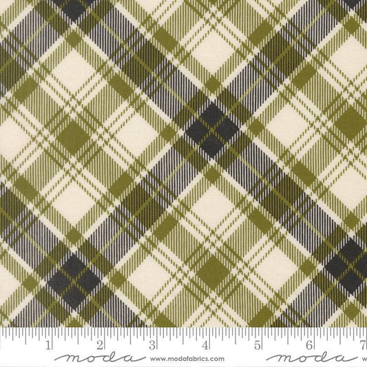 Image of Chilly Plaid Pine quilting cotton fabric by Sweetwater for Moda Fabrics. Features plaid on a green, cream, and blue background. Cute Little Fabric Shop.