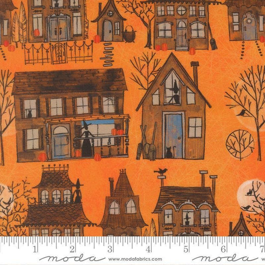 Image of Coven Witch Village Pumpkin quilting cotton fabric by Robin Pickens for Moda Fabrics. Features haunted houses on an orange background. Cute Little Fabric Shop.
