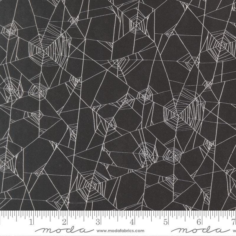 Image of Coven Spider Web Onyx quilting cotton fabric by Robin Pickens for Moda Fabrics. Features spiderwebs on a black background. Cute Little Fabric Shop.