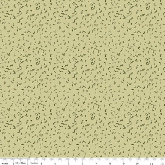Image of Tangled Gardens Seedlings Celery quilting cotton fabric by Diane Labombarbe for Riley Blake Designs. Features leaves on a green background. Cute Little Fabric Shop.