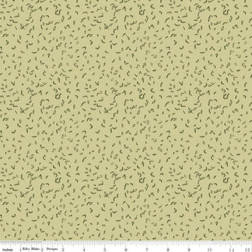 Image of Tangled Gardens Seedlings Celery quilting cotton fabric by Diane Labombarbe for Riley Blake Designs. Features leaves on a green background. Cute Little Fabric Shop.